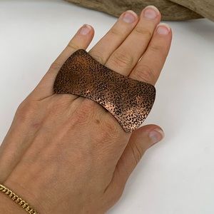 Dark bronze colored metal ring